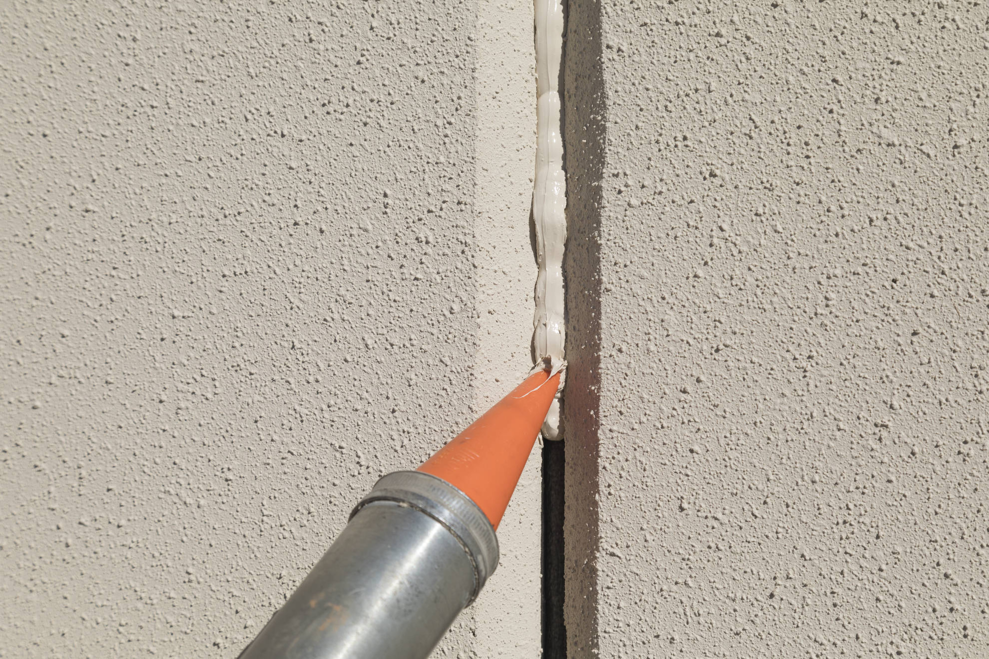 Image of caulk being applied.