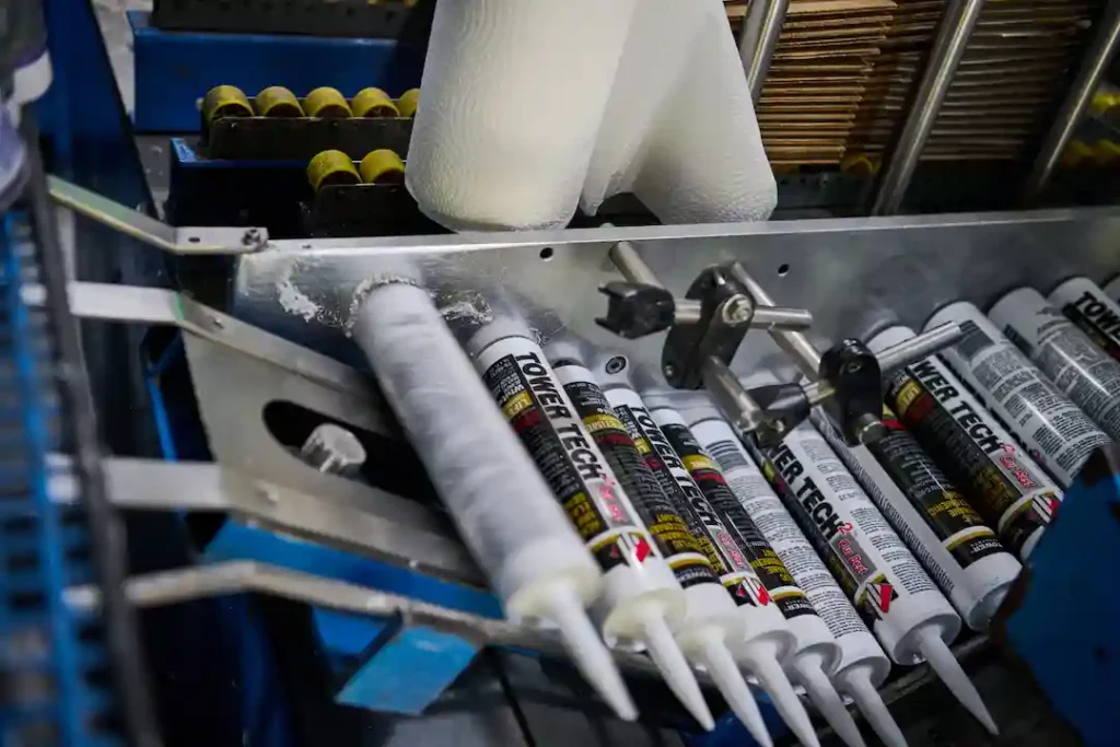 A machine demonstrating Vacuum-fill technology that eliminates trapped air during sealant cartridge filling